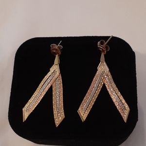 14k tricolor dangling earrings.